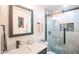 Modern bathroom with marble vanity, frameless shower, and updated fixtures at 3402 E Sunnyside Dr, Phoenix, AZ 85028