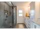 Elegant bathroom with marble countertops and walk-in shower at 3402 E Sunnyside Dr, Phoenix, AZ 85028