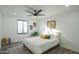 Bright bedroom with ceiling fan and stylish decor at 3402 E Sunnyside Dr, Phoenix, AZ 85028