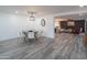 Open dining area with view of living room and fireplace at 3402 E Sunnyside Dr, Phoenix, AZ 85028