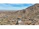 Aerial view of a house nestled in a mountainside community at 34157 N Mirage Ct, San Tan Valley, AZ 85144