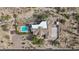 Overhead view of house, pool, and surrounding landscape at 34157 N Mirage Ct, San Tan Valley, AZ 85144