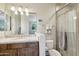 Modern bathroom with granite countertop, shower, and toilet at 34157 N Mirage Ct, San Tan Valley, AZ 85144