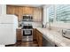 Well-equipped kitchen with granite countertops and stainless steel appliances at 34157 N Mirage Ct, San Tan Valley, AZ 85144