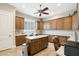 Large laundry room with ample cabinetry and island at 34157 N Mirage Ct, San Tan Valley, AZ 85144