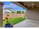 Covered patio, artificial turf, and block wall at 3432 E Alfalfa Dr, Gilbert, AZ 85298