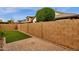 Artificial turf, block wall, and paver patio at 3432 E Alfalfa Dr, Gilbert, AZ 85298