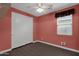 Cozy bedroom with double closet and wood floors at 3432 E Alfalfa Dr, Gilbert, AZ 85298