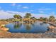 Waterfall and pond in The Bridges at Gilbert community at 3432 E Alfalfa Dr, Gilbert, AZ 85298