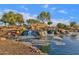 Waterfall and pond in The Bridges at Gilbert community at 3432 E Alfalfa Dr, Gilbert, AZ 85298