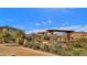 Relaxing community gathering space with benches under a pergola at 3432 E Alfalfa Dr, Gilbert, AZ 85298