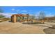 Covered picnic area with benches in a well-maintained community park at 3432 E Alfalfa Dr, Gilbert, AZ 85298