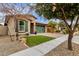 House exterior showcasing a well-maintained lawn and landscaping at 3432 E Alfalfa Dr, Gilbert, AZ 85298