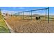 playground with swings and wood chip surface at 3432 E Alfalfa Dr, Gilbert, AZ 85298