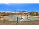 Community sprayground with shade structures at 3432 E Alfalfa Dr, Gilbert, AZ 85298