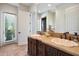 Bathroom boasts double vanity, a window, and decorative accents at 37018 N Tree Lined Trl, Carefree, AZ 85377