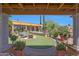 Inviting pool area with patio furniture and pergola at 37018 N Tree Lined Trl, Carefree, AZ 85377