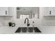 Modern kitchen sink and faucet with quartz countertops at 3718 E Elmington Cir, San Tan Valley, AZ 85140