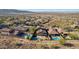 Aerial view of houses with solar panels and pools at 38213 N Raleigh Way, Anthem, AZ 85086