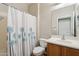 Clean bathroom with shower/tub and wood vanity at 38213 N Raleigh Way, Anthem, AZ 85086