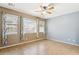 Bedroom with tile flooring, neutral walls, and mountain views at 38213 N Raleigh Way, Anthem, AZ 85086