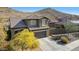 Two story house with a two car garage and mountain view at 38213 N Raleigh Way, Anthem, AZ 85086