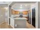 Kitchen with granite countertops and wood cabinets at 38213 N Raleigh Way, Anthem, AZ 85086