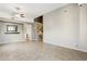 Open living area with staircase and tile floors at 38213 N Raleigh Way, Anthem, AZ 85086