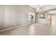 Bright living room with tile floors and ceiling fan at 38213 N Raleigh Way, Anthem, AZ 85086