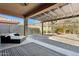 Covered patio with seating area, fire pit, and mountain views at 38213 N Raleigh Way, Anthem, AZ 85086