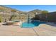 Inviting kidney-shaped pool with spa and mountain views at 38213 N Raleigh Way, Anthem, AZ 85086