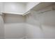 Spacious closet with shelving and hanging rod at 4050 E Cactus Rd # 201, Phoenix, AZ 85032