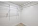 Walk-in closet with wire shelving and a hanging rod at 4050 E Cactus Rd # 201, Phoenix, AZ 85032