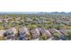 Aerial view of homes and neighborhood with mountain backdrop at 40901 N Courage Trl, Anthem, AZ 85086