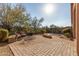 Landscaped backyard with fire pit and seating area at 40901 N Courage Trl, Anthem, AZ 85086