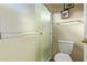 Clean bathroom with shower and toilet, featuring updated fixtures at 40901 N Courage Trl, Anthem, AZ 85086