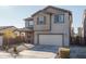 Two story house with attached garage and landscaping at 416 N 110Th Ave, Avondale, AZ 85323