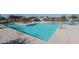 Community pool with lounge chairs and umbrellas at 416 N 110Th Ave, Avondale, AZ 85323