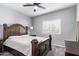 Spacious bedroom with dark wood furniture and carpeted floors at 4229 N 32Nd Ave, Phoenix, AZ 85017