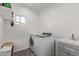 Laundry room with washer, dryer, and utility sink at 4229 N 32Nd Ave, Phoenix, AZ 85017