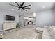 Open floor plan living room, featuring a kitchen and a sectional sofa at 4229 N 32Nd Ave, Phoenix, AZ 85017