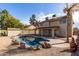 Inviting backyard oasis with a kidney-shaped pool at 4250 E Towne Ln, Gilbert, AZ 85234