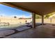 Covered patio overlooking a sparkling pool at 4250 E Towne Ln, Gilbert, AZ 85234