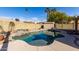 Relaxing kidney-shaped pool with rock waterfall feature at 4250 E Towne Ln, Gilbert, AZ 85234