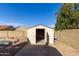 Well-maintained storage shed with double doors at 4250 E Towne Ln, Gilbert, AZ 85234