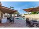 Relaxing backyard oasis with covered patio and refreshing pool at 4348 E Sheena Dr, Phoenix, AZ 85032