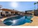 Inviting swimming pool with ample patio space for lounging and entertaining at 4348 E Sheena Dr, Phoenix, AZ 85032