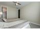 Bright bedroom featuring a ceiling fan, closet, and neutral color palette at 4354 N 27Th Pl, Phoenix, AZ 85016