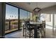 Dining area featuring hardwood floors, modern lighting and views of palm trees at 4354 N 27Th Pl, Phoenix, AZ 85016