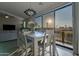 Dining area featuring hardwood floors, modern lighting and views from a large sliding glass door at 4354 N 27Th Pl, Phoenix, AZ 85016